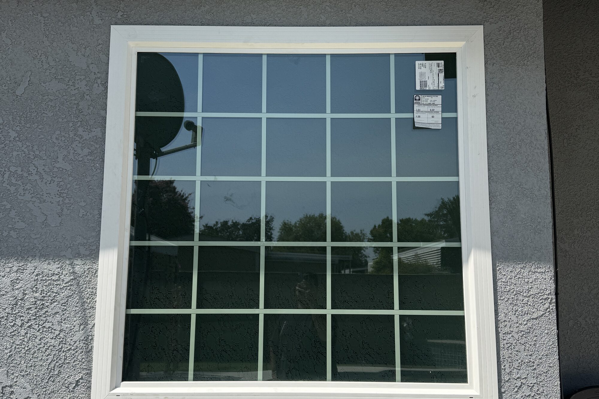 New white vinyl replacement window installed by Smart Home Improvements on a Visalia, CA home